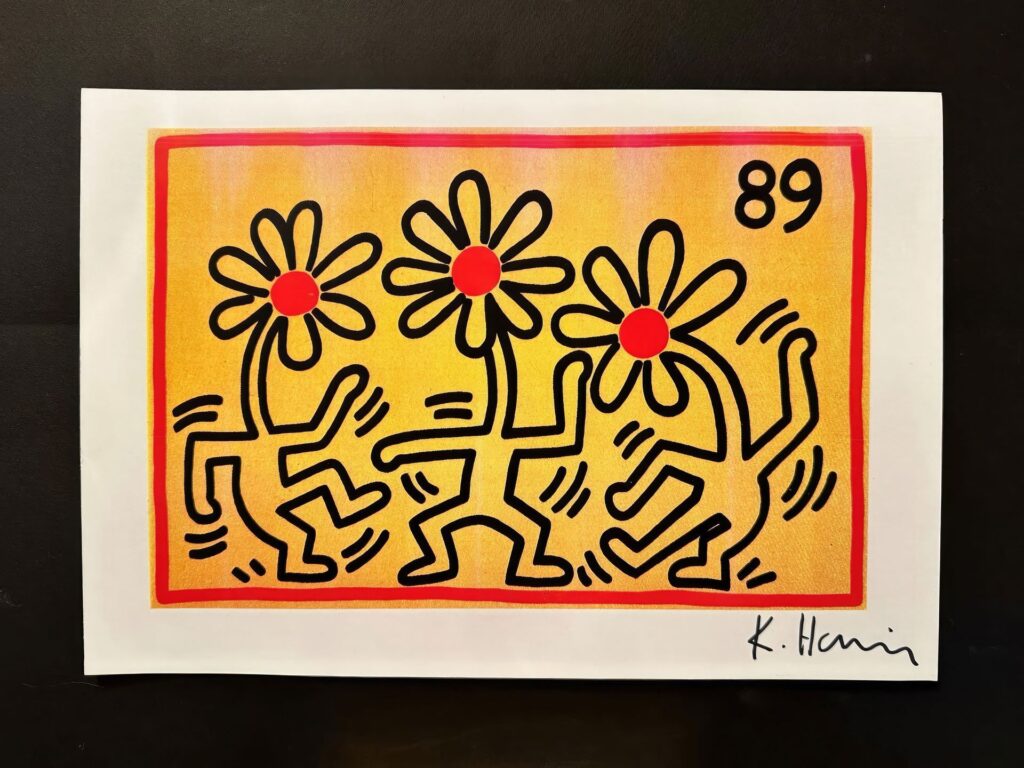 Keith Haring, Dancing Flowers (1989). Found here: https://www.encheres-luxembourg.lu/en/results/09-au-19-fevrier-pop-art/lot54-61 